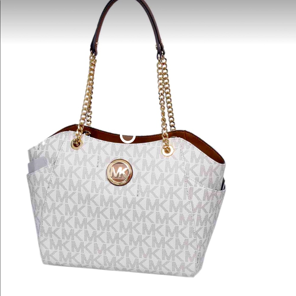 Medium size Michael Kors purse.